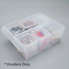 Clear plastic organizer with compartments containing small items on a gray background